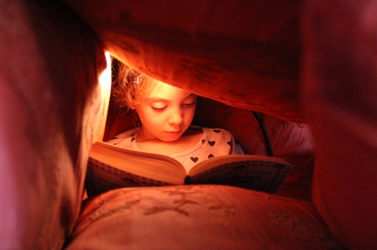 Violet loves nothing more than a cave of cushions and a good book.