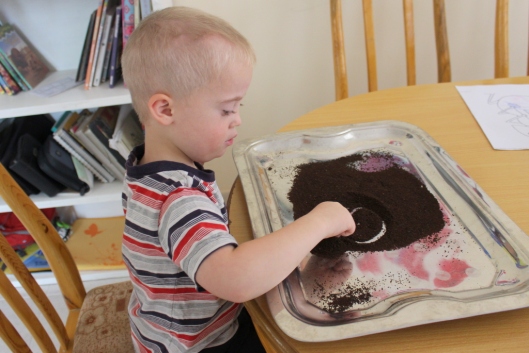 Writing the letter "A" in dried coffee grounds -- great suggestion Grandma!